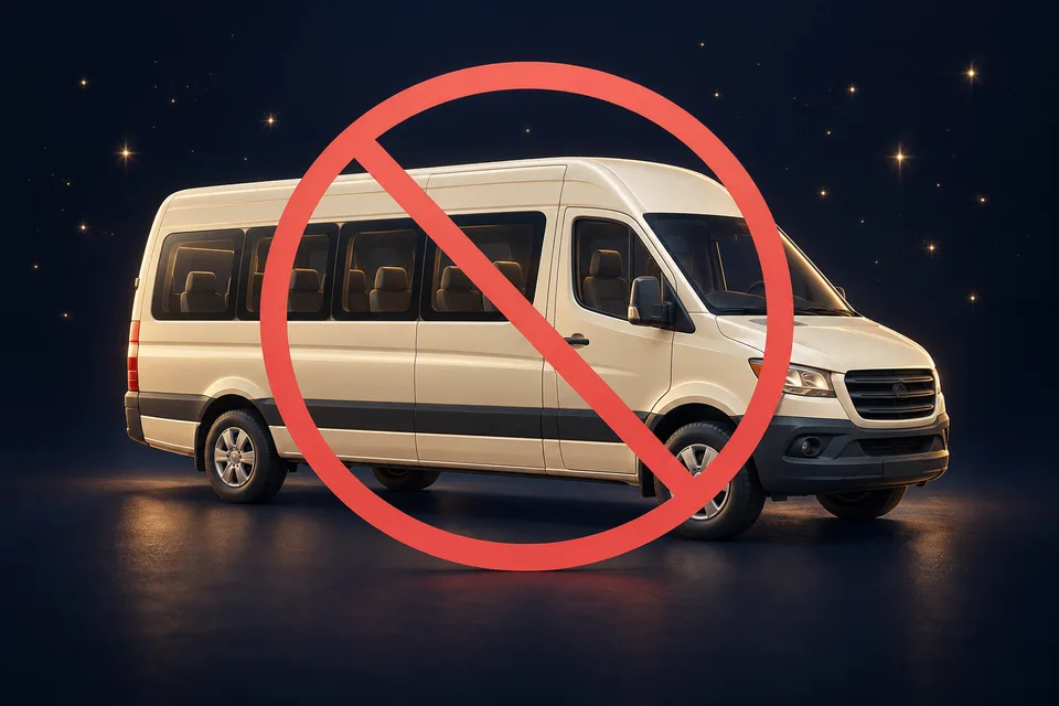A passenger minibus crossed out with a prohibition sign
